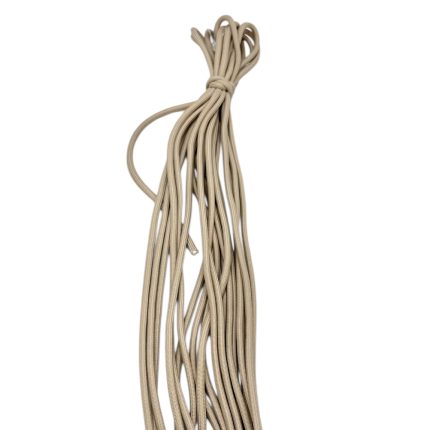 Beige paracord cords tied in a loose bundle with several strands hanging down.