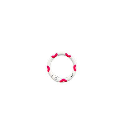 White circular silicone ring with pink patches along its surface.