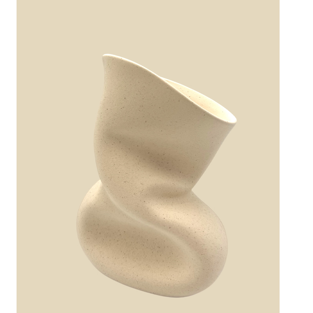 CC867110-8D06-7589-37B7-019D4E6790B2_11 | La Vie en Rose Abstract beige ceramic sculpture with twisting curves against a light tan background.