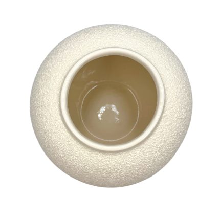Top-down view of a textured white spherical light fixture with a circular central opening
