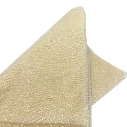 Glittery gold fabric napkin folded into a triangle shape on a white background.